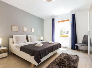 2 dormitorios, tabla de planchar con plancha, wifi y ropa de cama