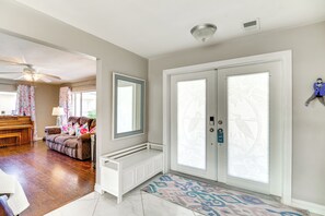 TV, fireplace, books - Centrally Located Cocoa Beach Haven: Walk to Shore (Cocoa Beach)
