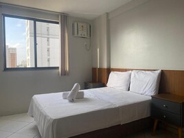 Apartamento básico, varanda coberta, vista para a cidade | 1 quarto, Wi-Fi de cortesia, roupa de cama