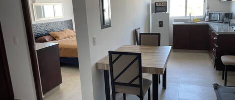 Standard Condo | Living area | 24-inch Smart TV with digital channels, Netflix, Hulu