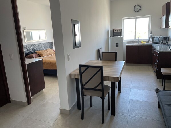 Standard Condo | Living area | 24-inch Smart TV with digital channels, Netflix, Hulu