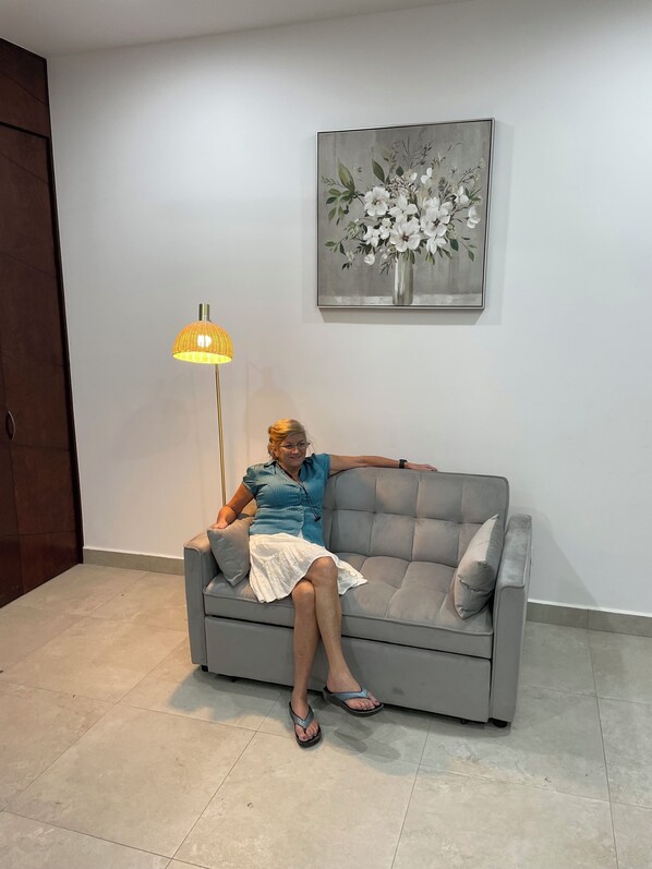 Deluxe Condo, 1 Queen Bed with Sofa bed | Living area | 24-inch Smart TV with digital channels, Netflix, Hulu