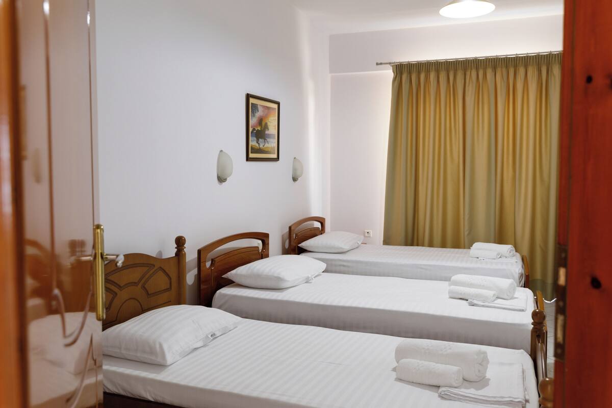 Basic Triple Room, Balcony, City View | Minibar, desk, free WiFi, bed sheets