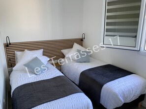 2 habitaciones, tabla de planchar con plancha, wifi y ropa de cama 