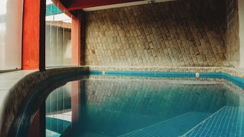 Indoor pool, outdoor pool, open 9:00 AM to 9:00 PM, pool loungers
