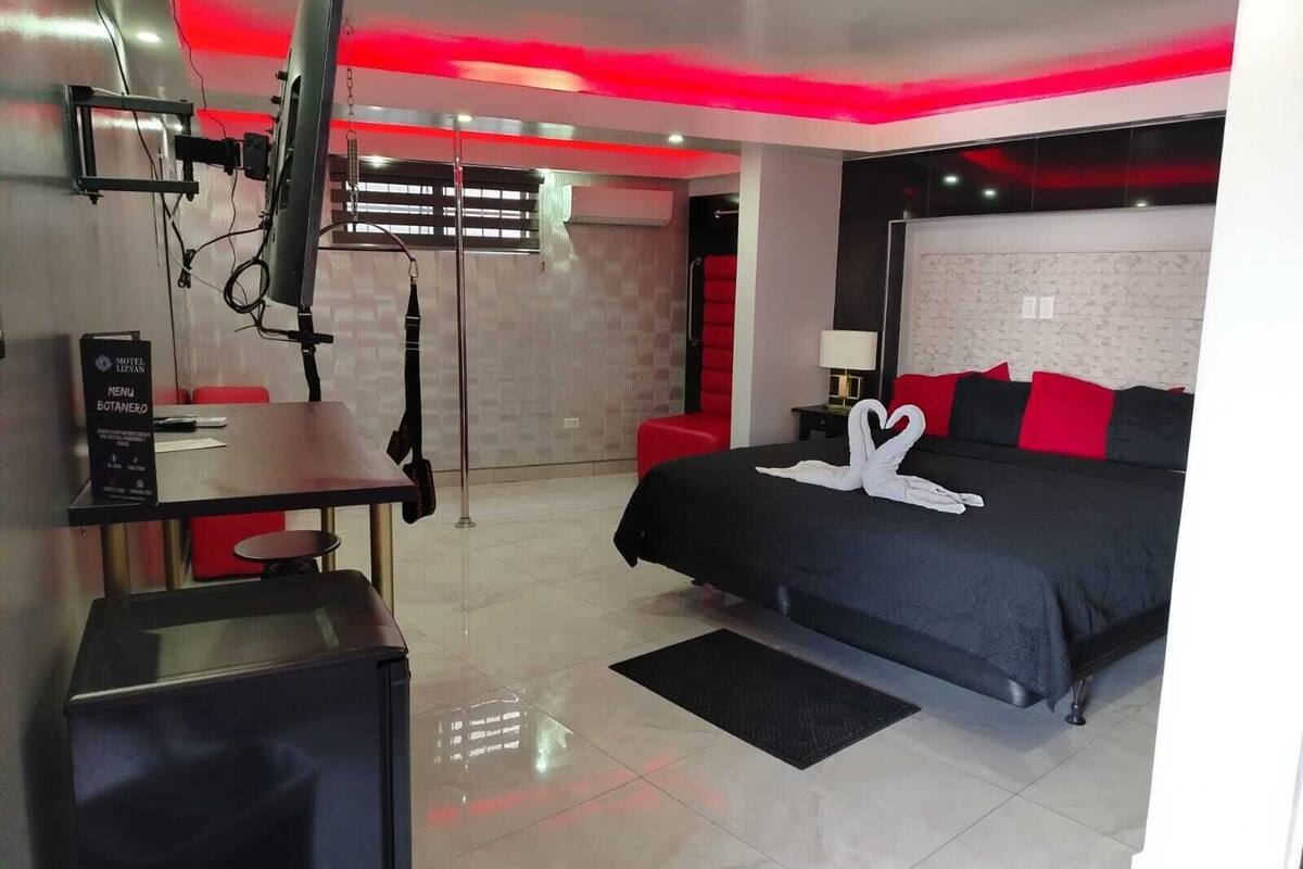 Deluxe Room, 1 Bedroom | 1 bedroom, laptop workspace, blackout drapes, iron/ironing board
