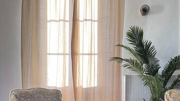 Deluxe Double or Twin Room, Pool View | Desk, laptop workspace, free WiFi