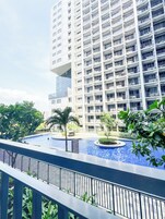 Signature Condo, Balcony, Pool View | Terrace/patio