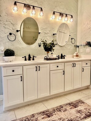 Shower, towels, soap, toilet paper