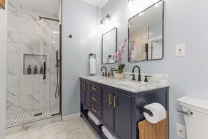 Shower, hair dryer, towels, soap