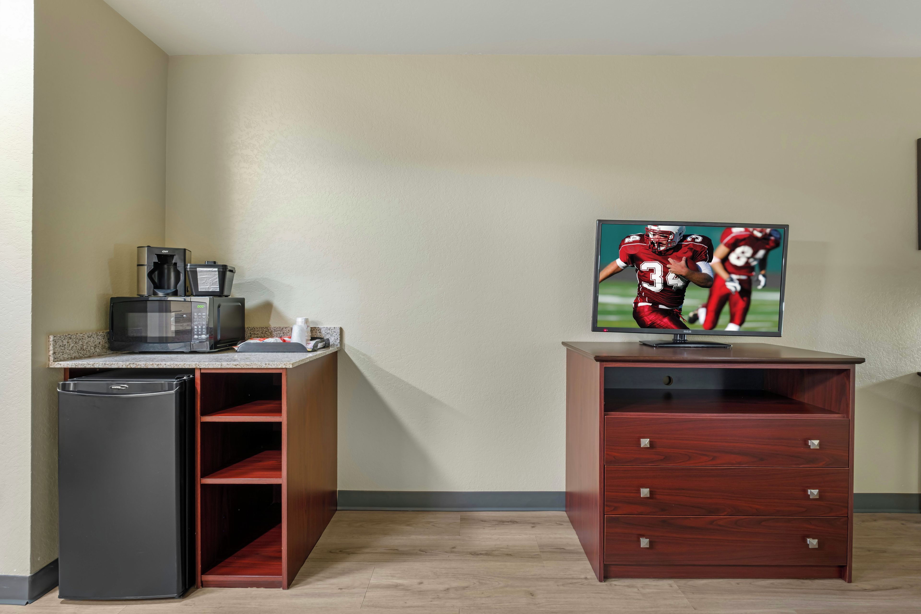 Desk, laptop workspace, blackout drapes, iron/ironing board