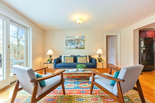 Spacious, stylish, and sunlit, our living room is designed for comfort and relaxation!