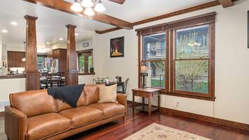 House, Multiple Beds, Patio, Garden View (7510 Poudre River Rd) | Living area | 65-inch flat-screen TV with digital channels, fireplace