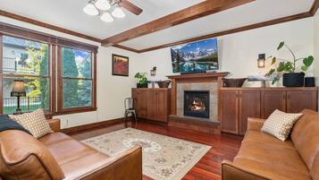 House, Multiple Beds, Patio, Garden View (7510 Poudre River Rd) | Living area | 65-inch flat-screen TV with digital channels, fireplace