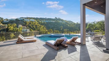 Outdoor pool, pool umbrellas, pool loungers