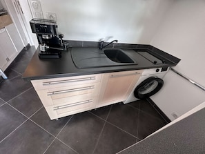 Fridge, microwave, coffee/tea maker, toaster