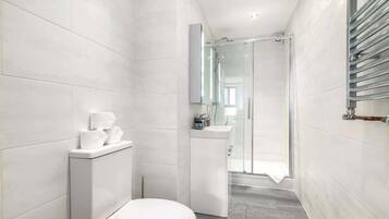 Shower, hair dryer, shampoo