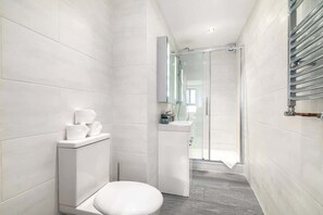 Shower, hair dryer, shampoo