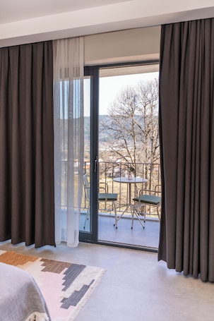 Deluxe Double Room, Lake View | In-room safe, desk, blackout drapes, free WiFi