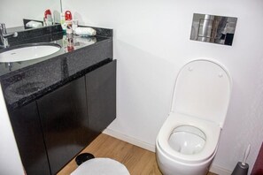 Shower, eco-friendly toiletries, hair dryer, bidet