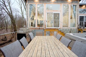 Enjoy al fresco dining with a grill and convenient refrigerator nearby.