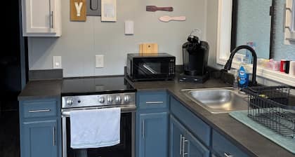 Whispering Pines - a Charming 2-bedroom cabin with WiFi, AC in serene Pipestem