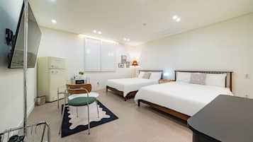 Habitación doble superior, 2 camas de matrimonio | 1 dormitorio, wifi gratis, ropa de cama