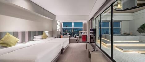 Premium bedding, free minibar, in-room safe, soundproofing