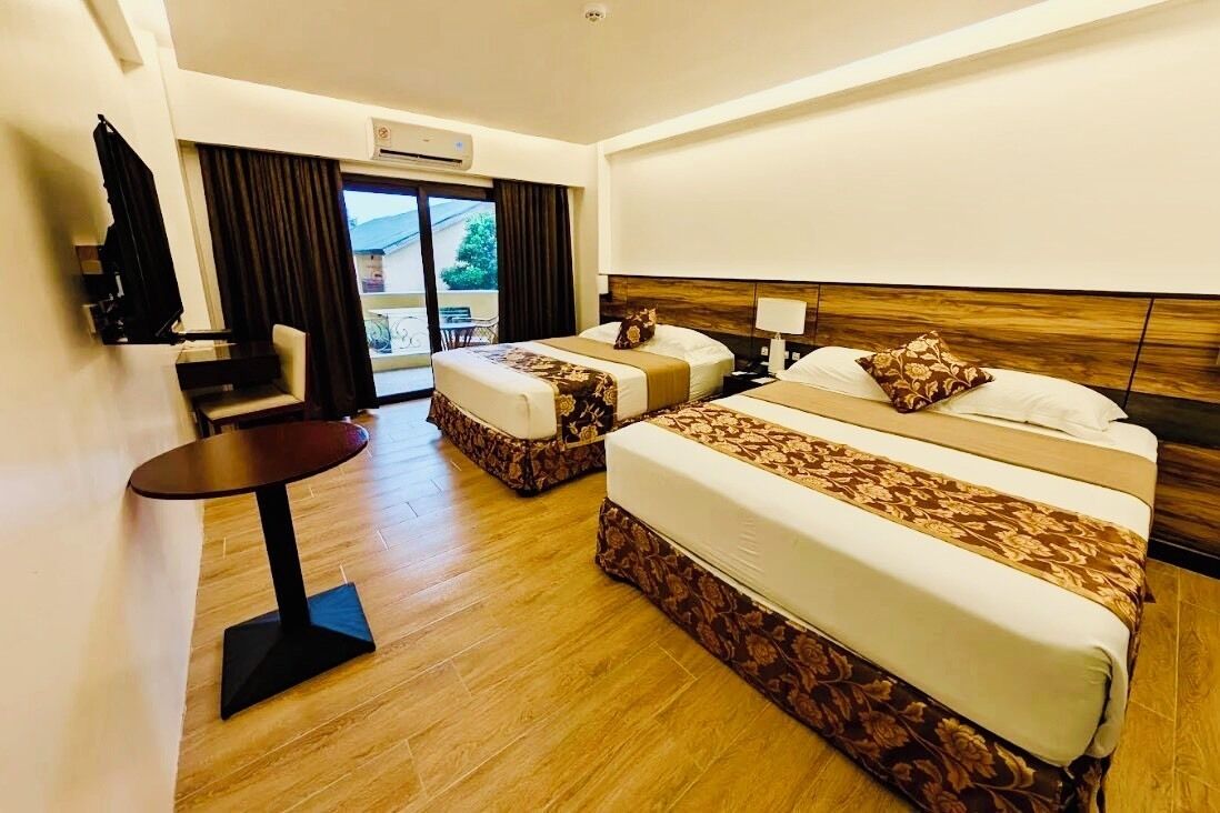 Camera Grand con letto matrimoniale o 2 letti singoli, idromassaggio, vista resort | Vista giardino