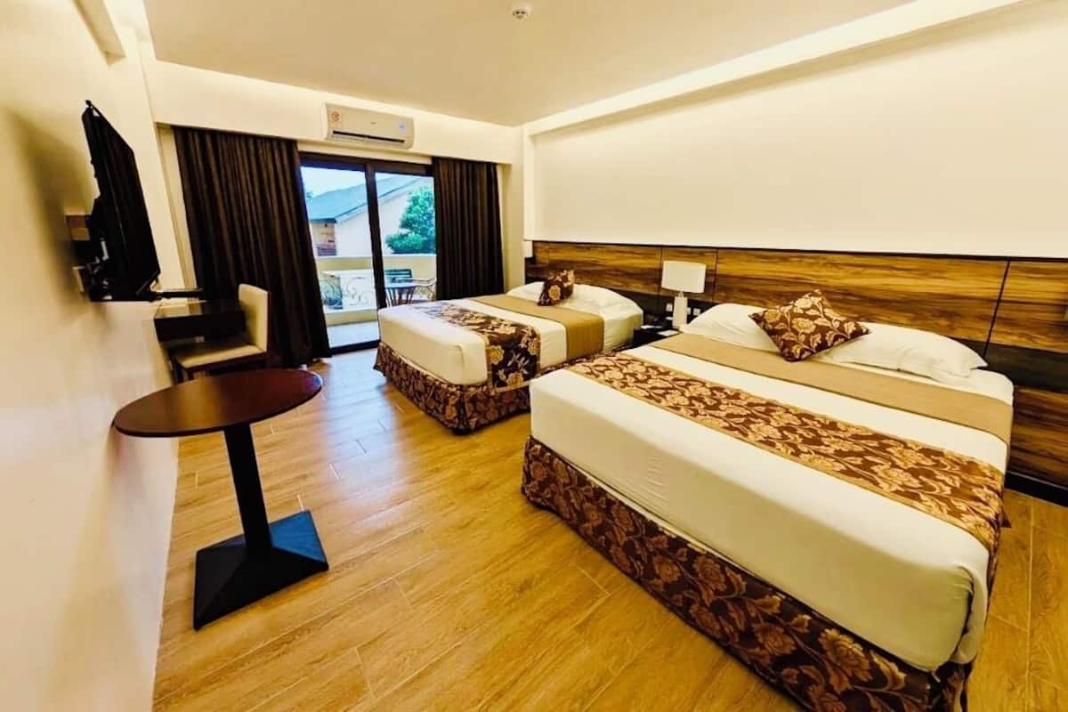 Camera Grand con letto matrimoniale o 2 letti singoli, idromassaggio, vista resort | Vista giardino