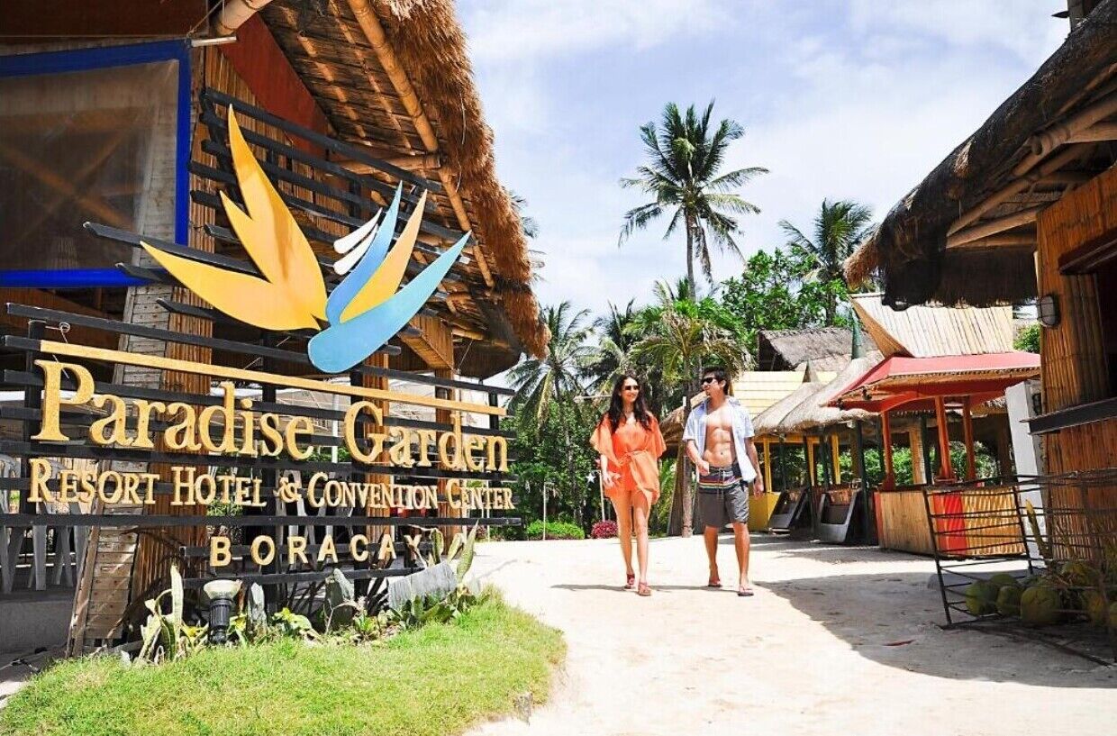 A sign for Paradise Garden Resort Hotel & Convention Center in Boracay.