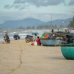On the beach, white sand, beach towels, kayaking