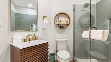 Shower, hair dryer, towels, soap