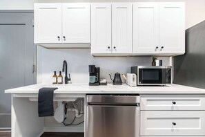 Fridge, microwave, dishwasher, coffee/tea maker