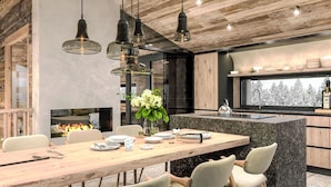 A modern kitchen with a central island, wooden ceiling, and pendant lighting. - Nice apartment for 4 people with WIFI, TV, balcony and pets allowed (Solden)