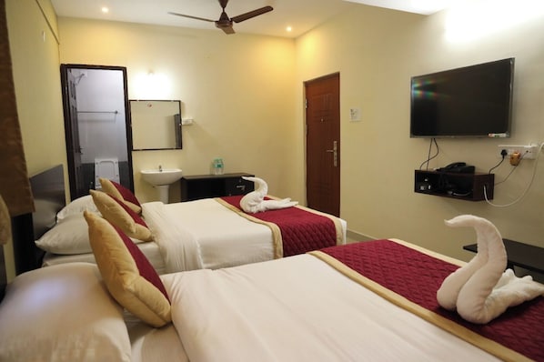 Family Room | Hypo-allergenic bedding, desk, free WiFi, bed sheets - Kalyan Residency (Madurai)