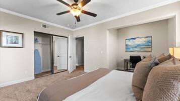 1 bedroom, desk, iron/ironing board, travel crib