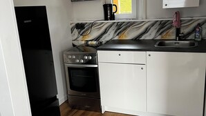 Geladeira, fogão, cooktop, chaleira elétrica