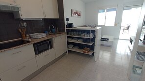 Fridge, microwave, coffee/tea maker, toaster