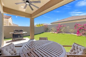 Outdoor dining - Updated Condo w/ Large Patio, 80” TV, Garage & Access to Pools, Golf & Fitness (Rancho Mirage)