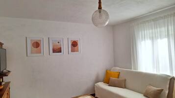 Apartment (Two Bedroom Apartment (Ana)) | Living room | 32-inch flat-screen TV with satellite channels