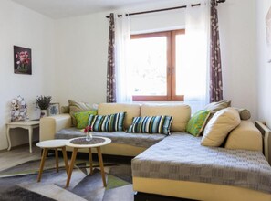 Apartment (Two Bedroom Apartment) | Living room | 32-inch flat-screen TV with cable channels - Charming Zadar Apartment Near Old Town With Convenient Access to Beaches (Zadar)