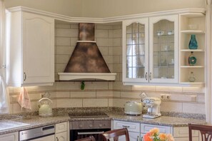 Fridge, oven, dining tables