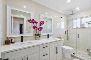 Shower, hair dryer, towels, soap