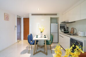 Apartment, 3 Bedrooms | Private kitchen | Full-size fridge, electric kettle, cookware/dishes/utensils - Shanghai Hills & Wanye Prime Stay (Shanghai)