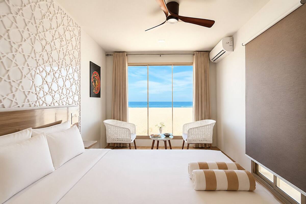 Habitación Deluxe doble, vistas al mar | Caja fuerte, escritorio, espacio para trabajar con un portátil