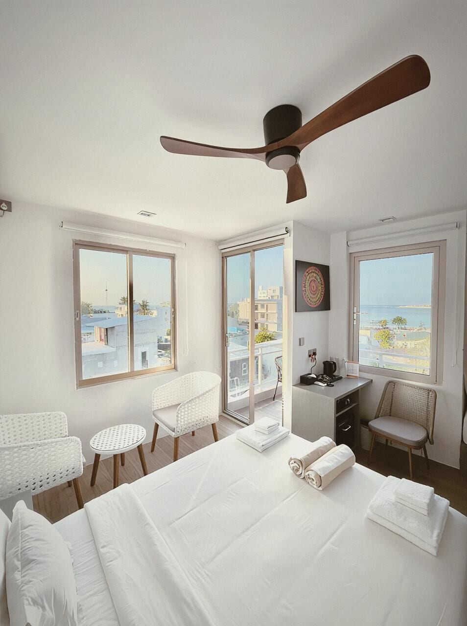 Family Triple Room, Sea View | In-room safe, desk, laptop workspace, soundproofing
