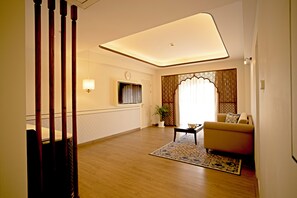 Ananta Suite with Hill View and Balcony | Living area | 55-inch Smart TV with digital channels - Bhagirathi By Atishay (Haridwar)