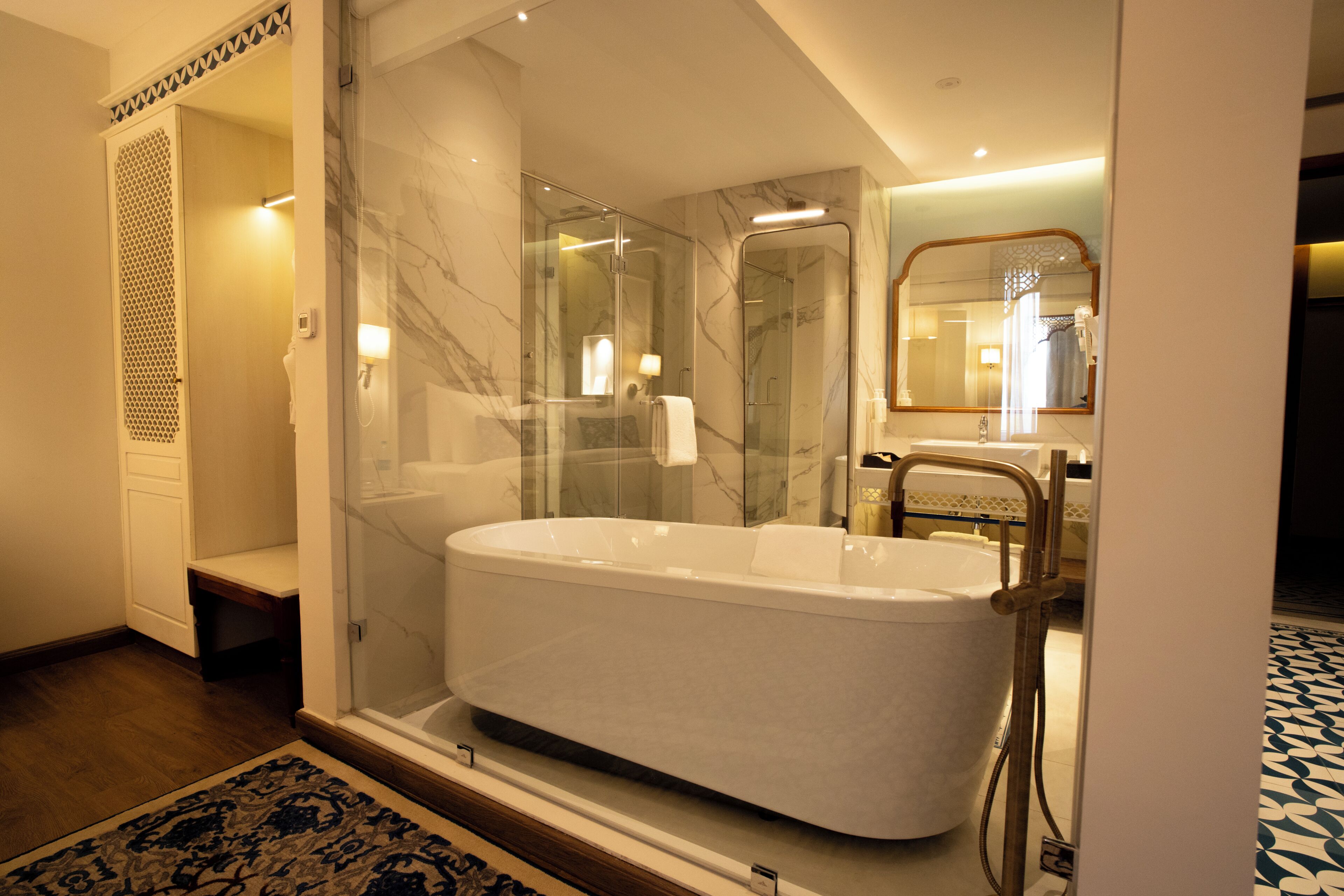 Purna King Room with Hill view | Bathroom | Shower, rainfall showerhead, hair dryer, bathrobes