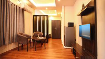 Comfort Apartment, Non Smoking, Patio | Living area | Flat-screen TV